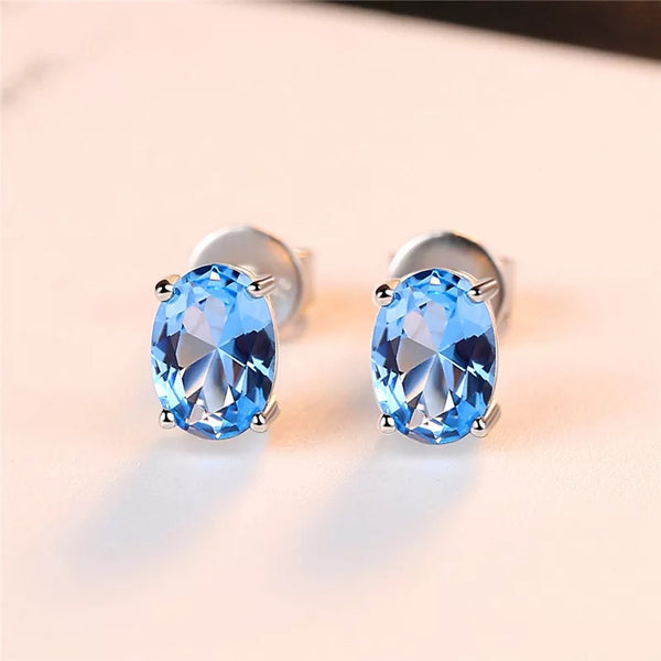 Pendientes de Topacio Azul Tratada en plata rodiada - curacionholistica